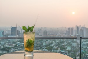 Mojito cocktail on table in rooftop bar
